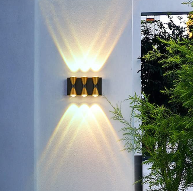 Amangazini 3 way wall sconce with modern design producing ambient lighting effects