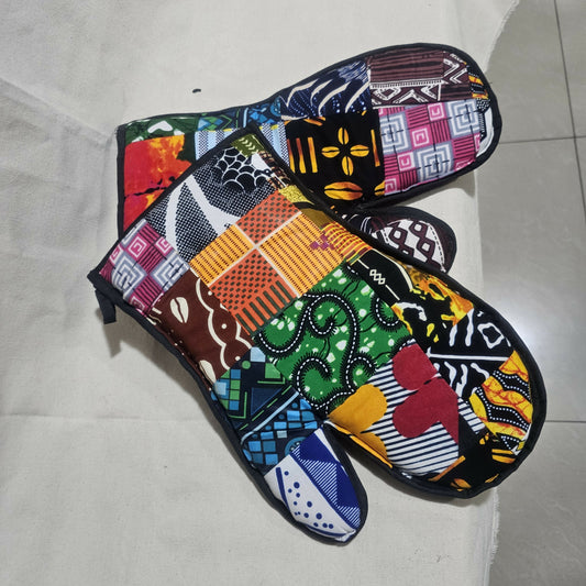 Colorful patterned oven mitts on a light background