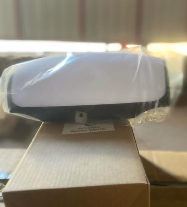 White light on a cardboard box with a blurred background