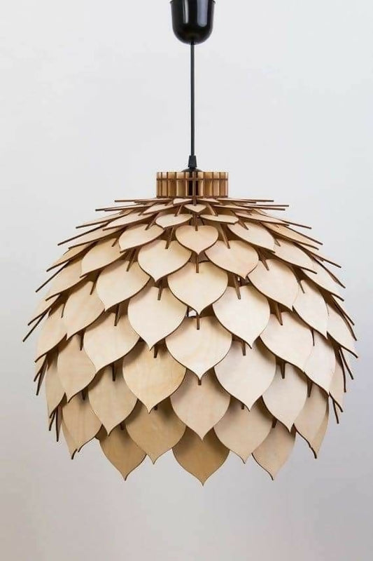 Wooden pendant light with leaf-like design on a plain background