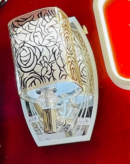 Elegant bespoke LED light for walls with floral design shade and mirrored base for stylish decor