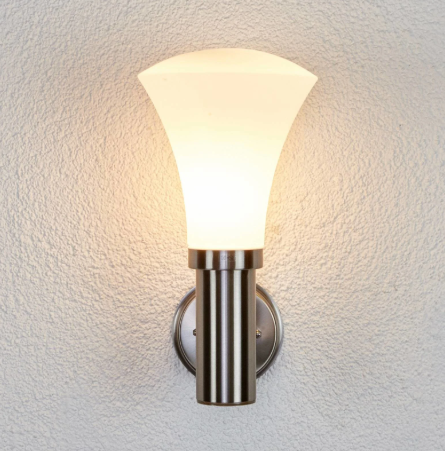 Classy silver wall sconce with a curved glass shade for elegant lighting decor
