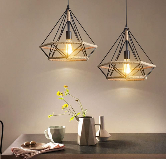 Amangazini Cottoned Pendant Light in a modern dining setting with a vase and tableware