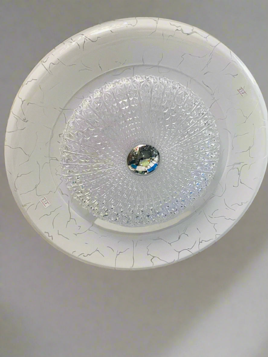 Amangazini elegant recessed lighting fixture with a decorative crystal design and modern white base