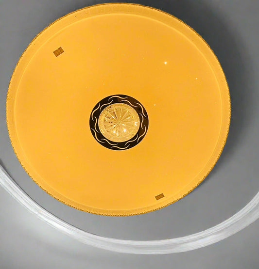 Stylish Amangazini flush mount ceiling light in a round design with a stunning golden finish