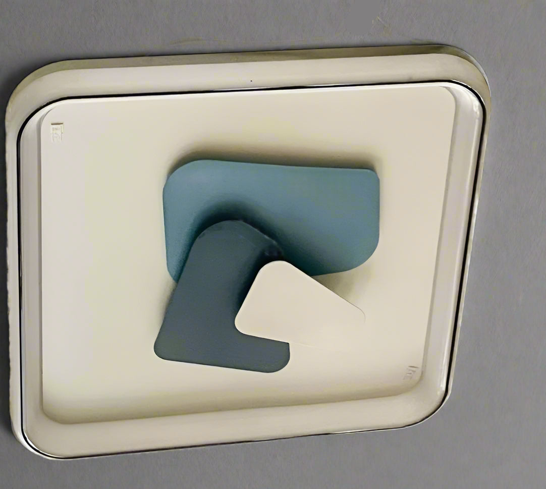 GeoGlow LED ceiling light in modern design featuring layered geometric shapes in soft colors