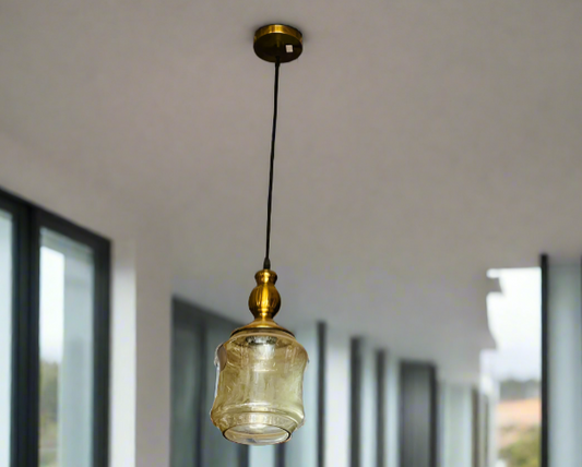 Amangazini golden cage pendant light with a glass shade for modern home interiors