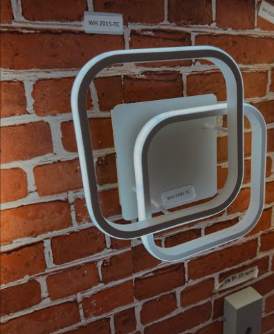 Amangazini Intersecting wall light design in modern style against a brick wall
