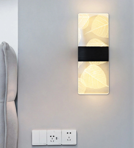 Amangazini leaf motif wall panel lighting featuring elegant leaf designs and a sleek black band