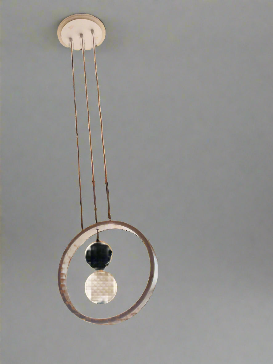 Amangazini modern double orb pendant light featuring a sleek design with clear and black orbs