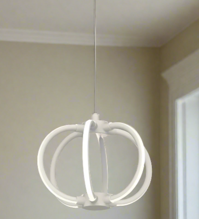 Amangazini Orbital LED Cage Pendant in white hanging in a beige room with modern minimal design