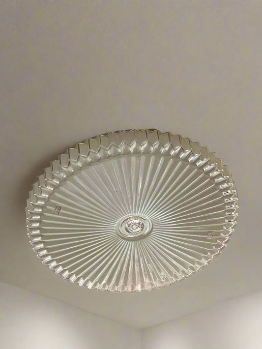 Amangazini Prism Burst ceiling light featuring a unique glass design for modern interior decor