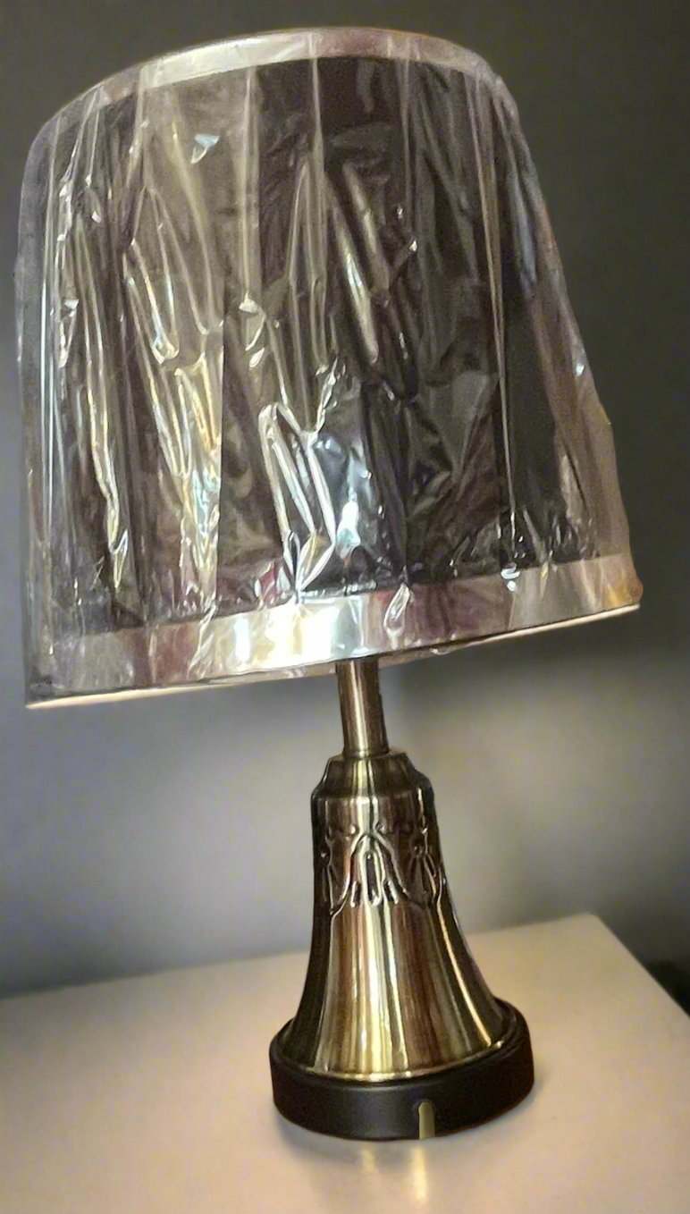 Amangazini sophisticated table lamp with decorative base and stylish shade covered in plastic