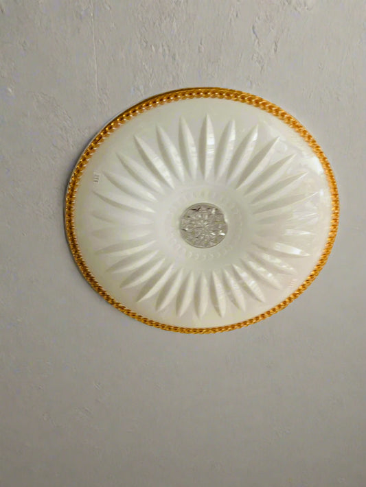 Amangazini Sunburst ceiling light with intricate design and a central crystal embellishment