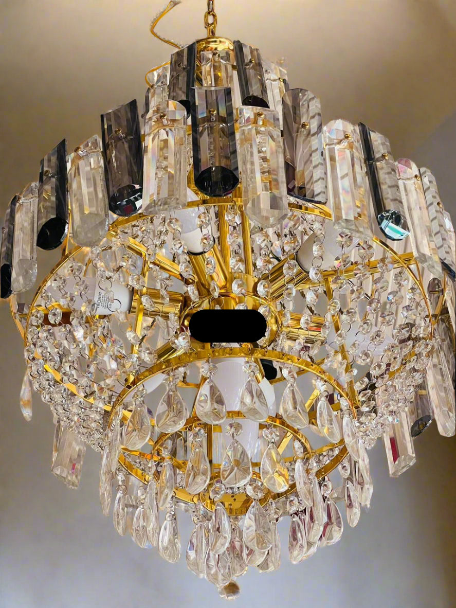 Stunning Amangazini unique crystal chandelier design featuring elegant crystal details and gold accents