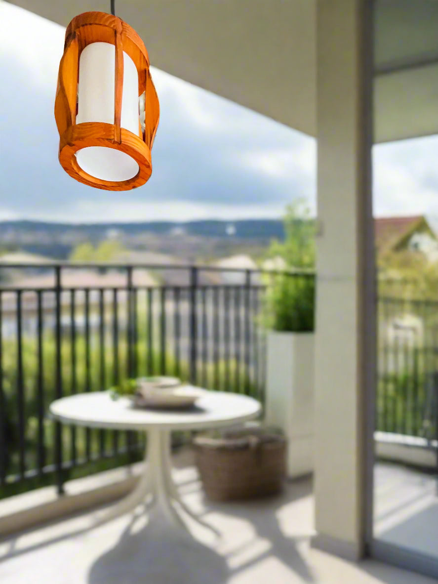 Amangazini wood ceiling pendant light in a modern outdoor setting, illuminating the patio area