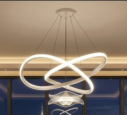 Modern chandelier with circular design in a room setting