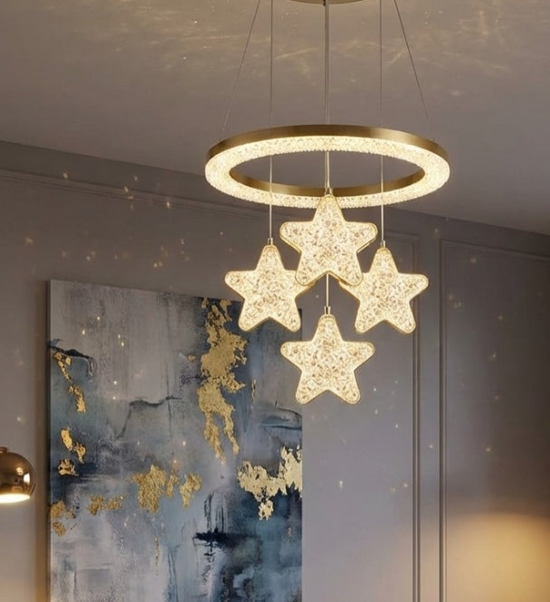 Decorative ceiling light fixture with star-shaped lights in a room setting.