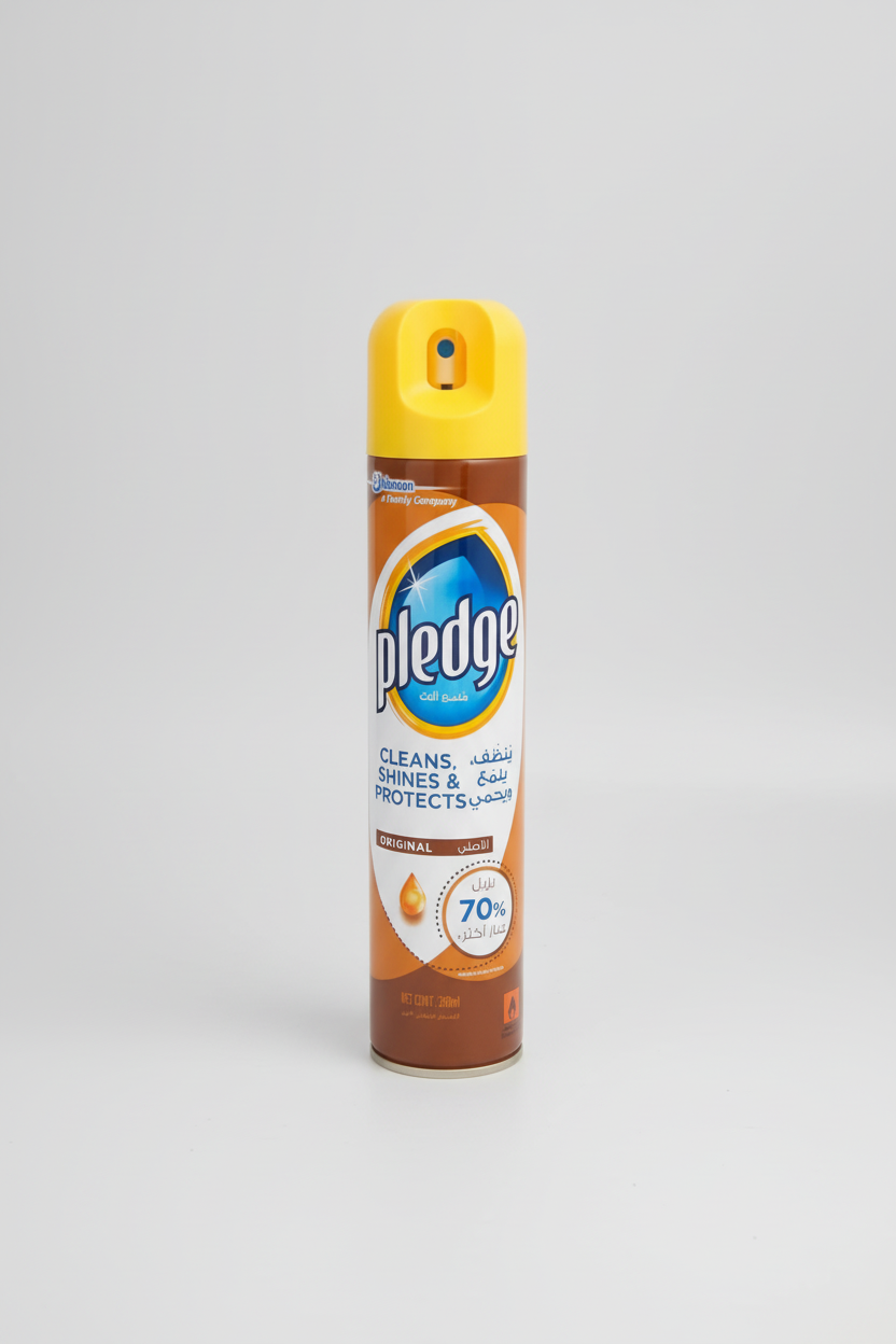 Pledge spray bottle on a white background