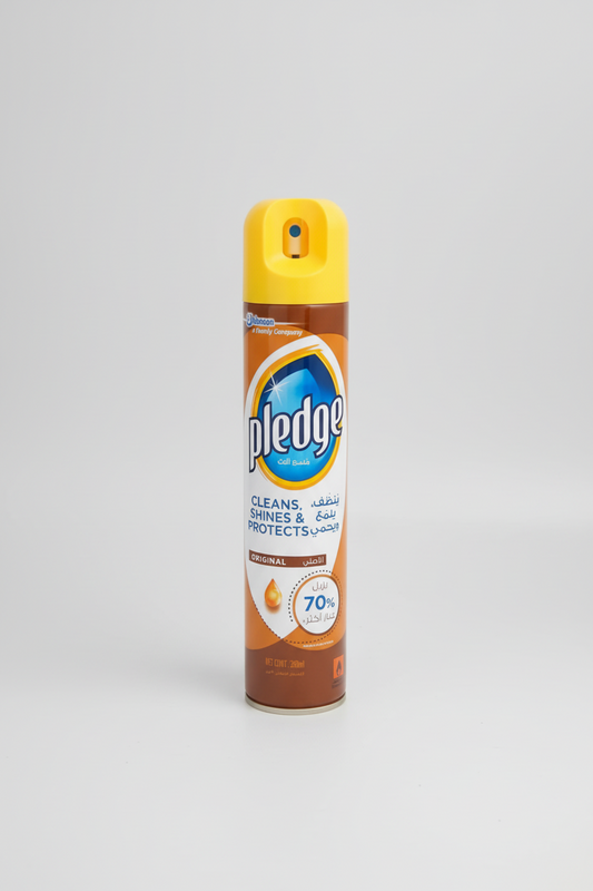 Pledge spray bottle on a white background