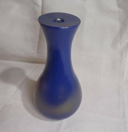 Beautifully crafted wooden vase finished in striking blue and gold.