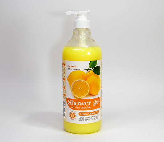 Yellow bottle of lemon shower gel with pump on a white background