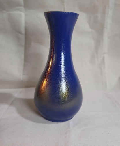 Beautifully crafted wooden vase finished in striking blue and gold.