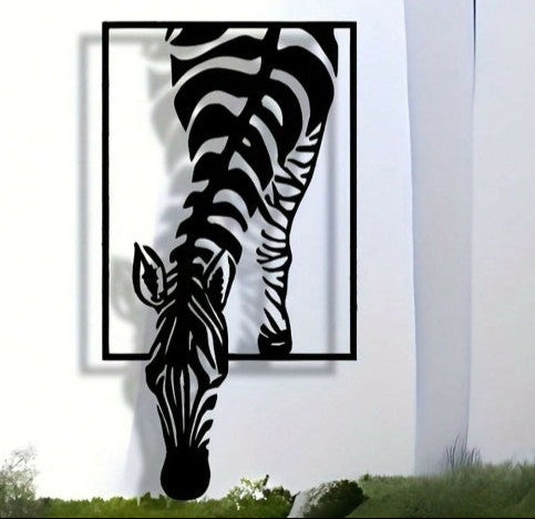 Metal zebra sculpture on a white wall