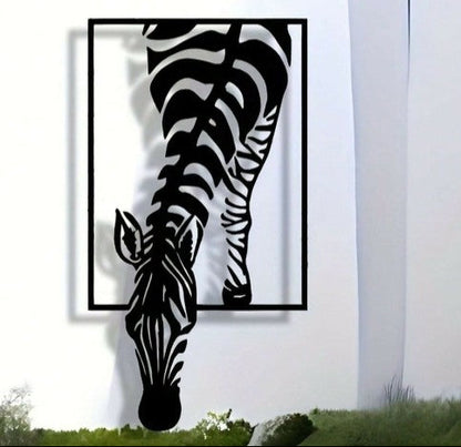 Metal zebra sculpture on a white wall