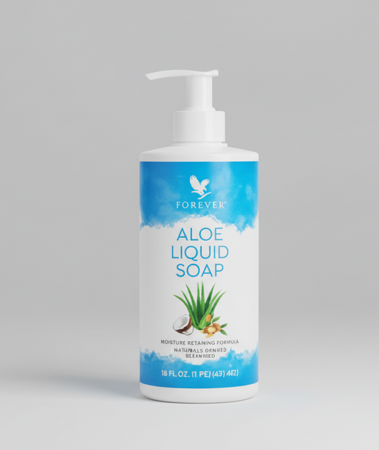 Aloe liquid soap bottle on a wooden coaster with a blurred background