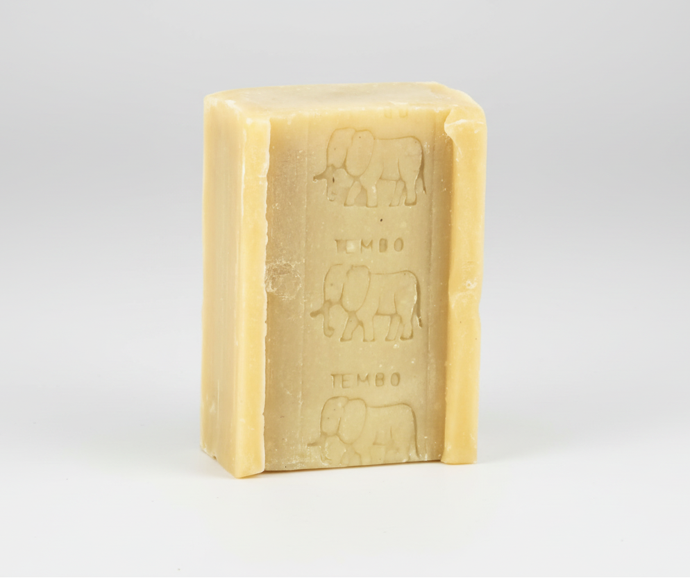Bar of soap with elephant embossing on a white background
