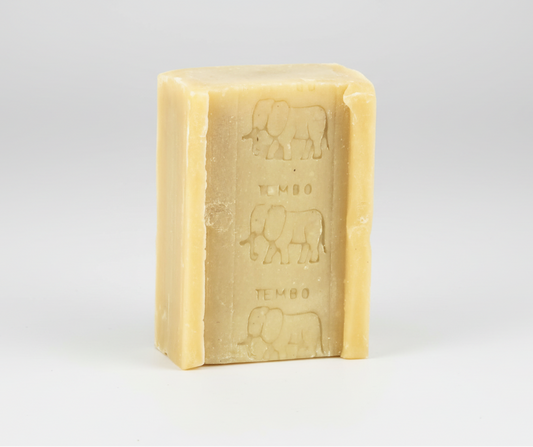 Bar of soap with elephant embossing on a white background