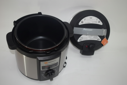 Pressure cooker with lid on a white background