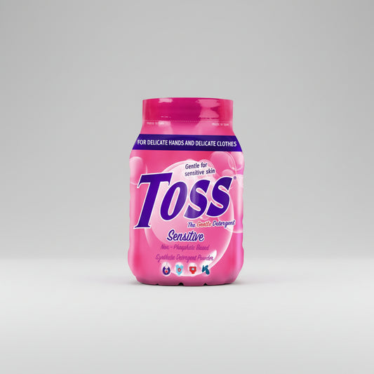 Pink container of Toss gentle detergent powder on a white background