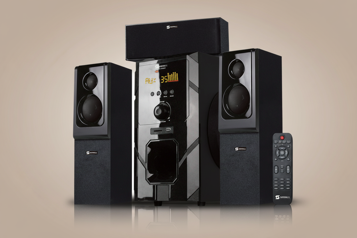 Black home theater system with speakers and a central console on a white background