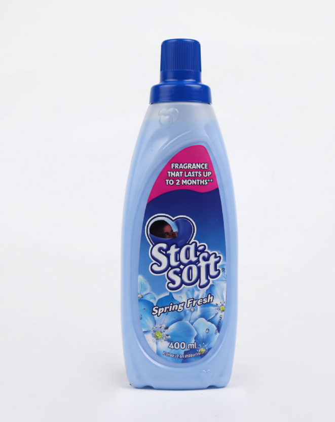 Star-Soft laundry detergent bottle with blue cap on a white background