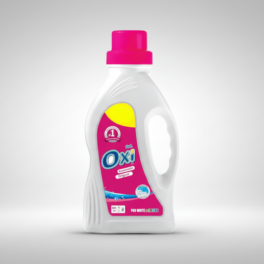 Oxi laundry detergent bottle with pink cap on a white background