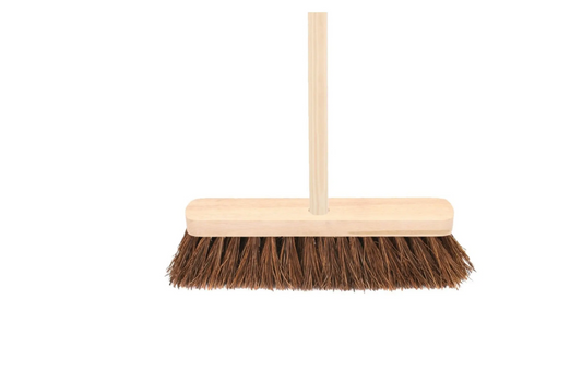 Broom with wooden handle and bristles on a white background