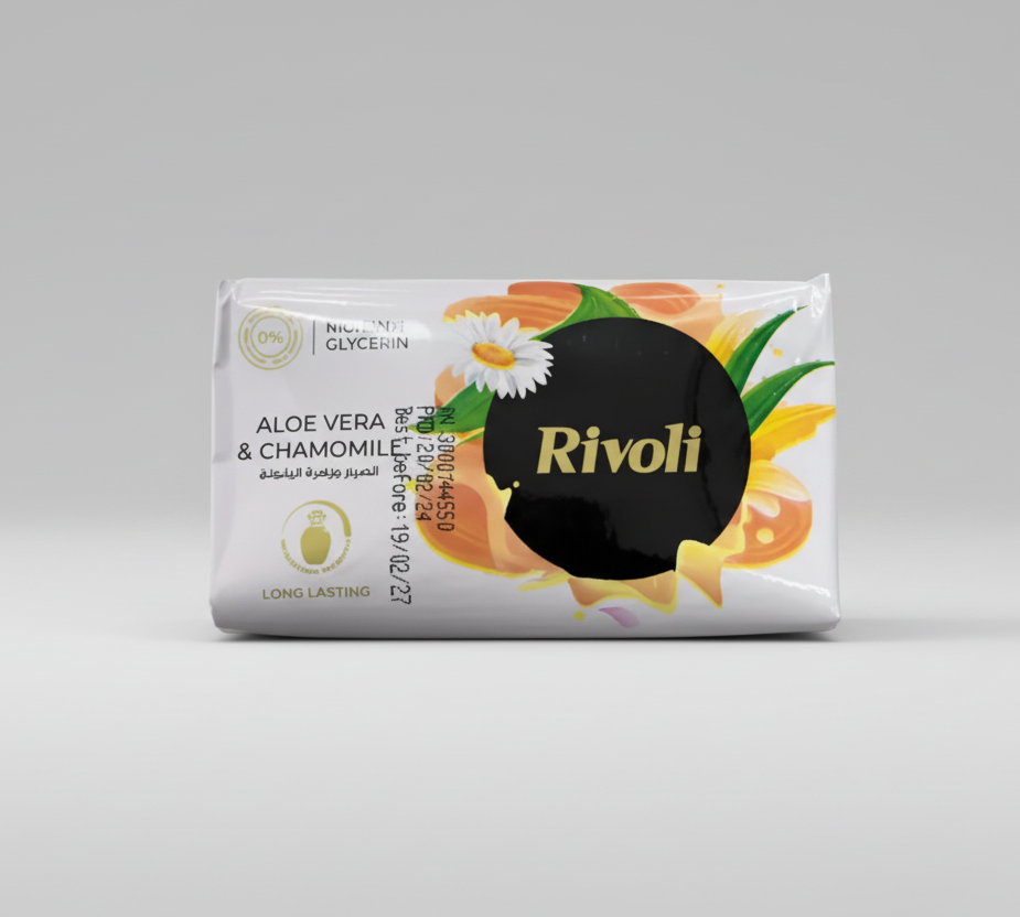 Bar of soap with Rivoli branding and aloe vera and chamomile imagery on a white background