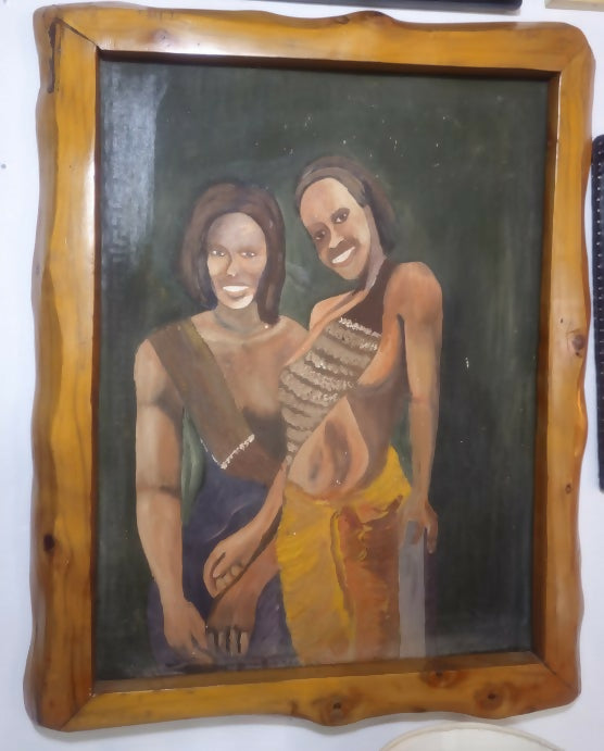 Painting of two people in a wooden frame on a white wall