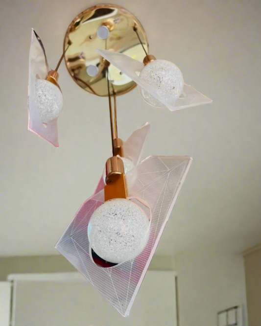 Decorative ceiling light fixture with a spherical lampshade and gold accents.