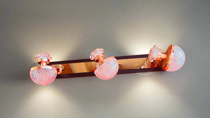 Decorative wall sconce with crystal accents on a red background