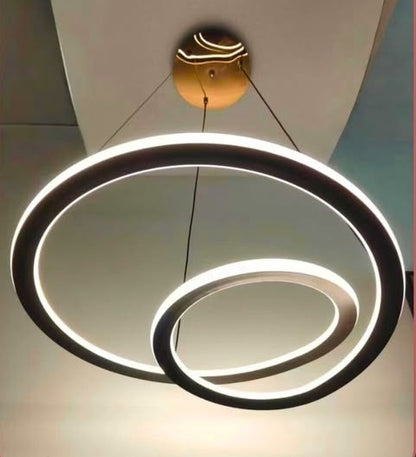 Modern chandelier with circular design on a ceiling
