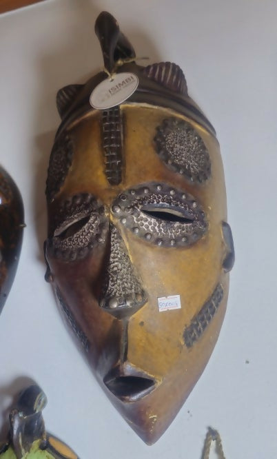 African mask with decorative patterns