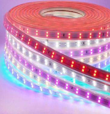 Here are a few alt tag options for the image, focusing on visual details:

**Concise:**

*   Coiled LED light strip with multicolor lights.

**More descriptive:**

*   Roll of flexible LED light strip displaying red, white, purple, and blue colors.

**If you want to include a specific function:**

*   Multicolor LED strip for lighting applications coiled on a roll.