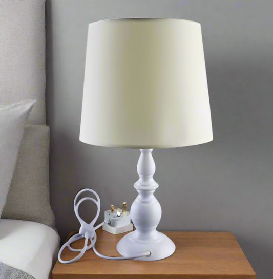 Amangazini bedside nightstand lamp with a white shade and elegant base, perfect for bedroom decor