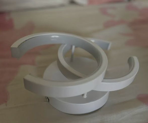 Amangazini double semi-circle wall light design with modern curved shape and sleek white finish