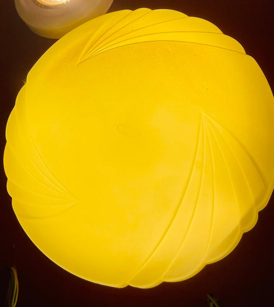 Stylish Flush Mount Lighting Fixture with a yellow decorative glass shade for modern interiors