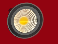 Close-up of Amangazini FrostedGlow spotlight with a circular design and warm LED light