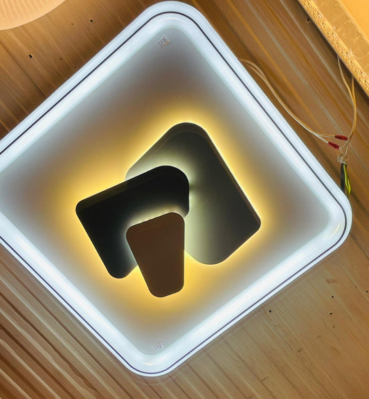 GeoGlow LED ceiling light in modern design with warm illumination and geometric shapes